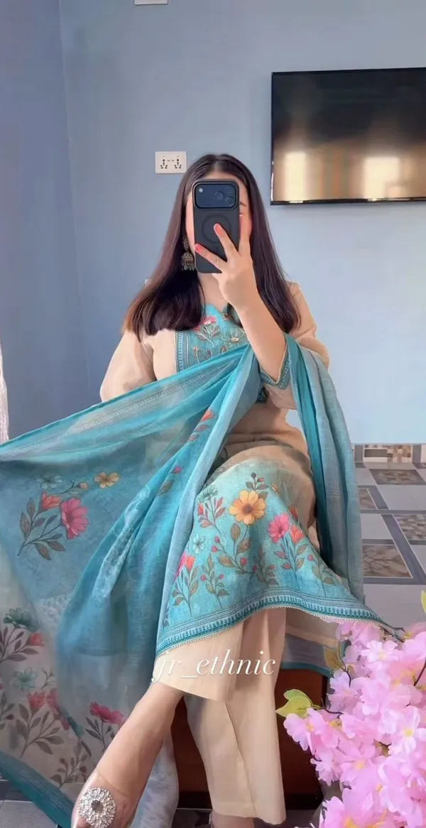 Linen_soft_Suit_with_exquisite_Peacock_artwork,_handwork_and_katha_work_on_it_with_paired_Pant_and_Digital_Dupatta