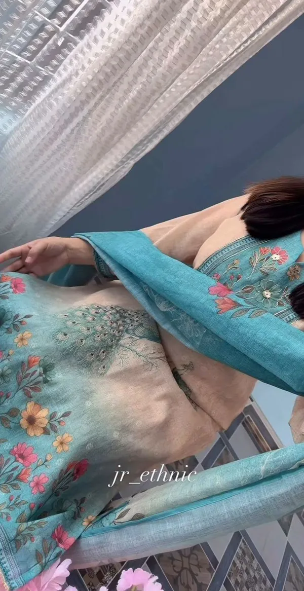 Linen_soft_Suit_with_exquisite_Peacock_artwork,_handwork_and_katha_work_on_it_with_paired_Pant_and_Digital_Dupatta
