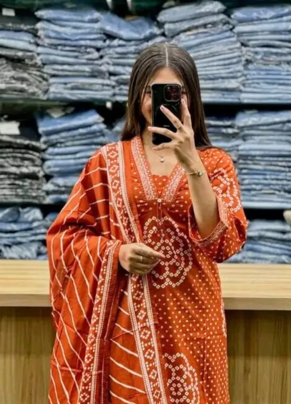 Orange_Bandhej_Kurta_and_Lehriya_Bottom_Embroidery_lace_on_Neck_line_and_sleeves_with_Mul_Dupatta