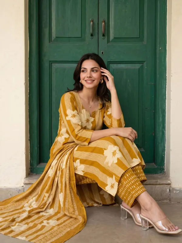 Yellow_cotton_Kurta_set_with_cotton_pant_and_dupatta_with_Sequence_work_on_Neck_line