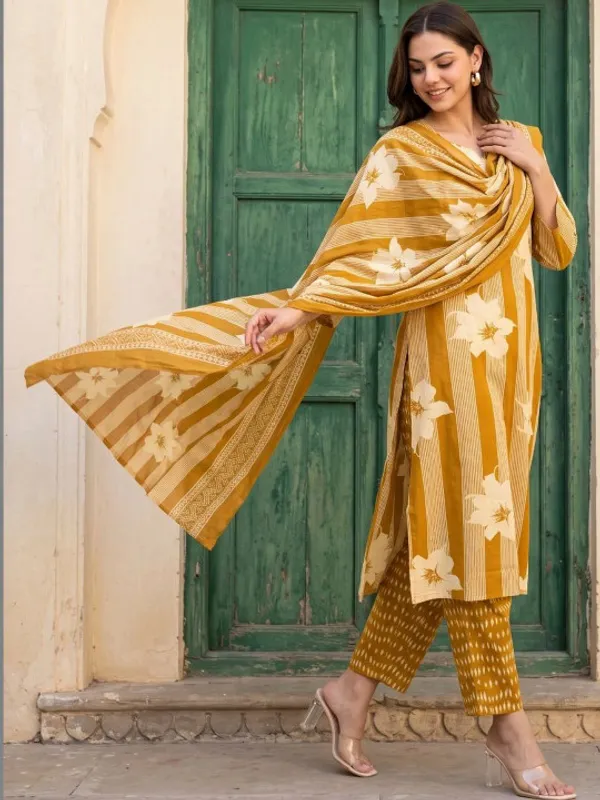 Yellow_cotton_Kurta_set_with_cotton_pant_and_dupatta_with_Sequence_work_on_Neck_line