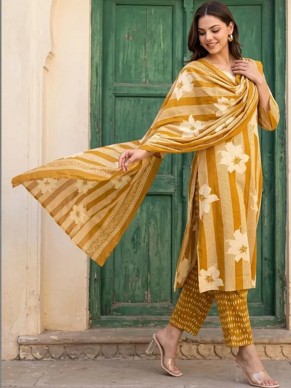 Yellow_cotton_Kurta_set_with_cotton_pant_and_dupatta_with_Sequence_work_on_Neck_line