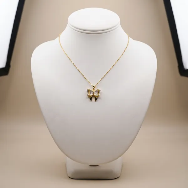 Arianna_Bow_Charm_Pendant_Necklace