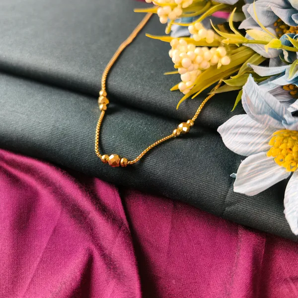 Billie__Diamond-Cut_Gold_Bead_Necklace