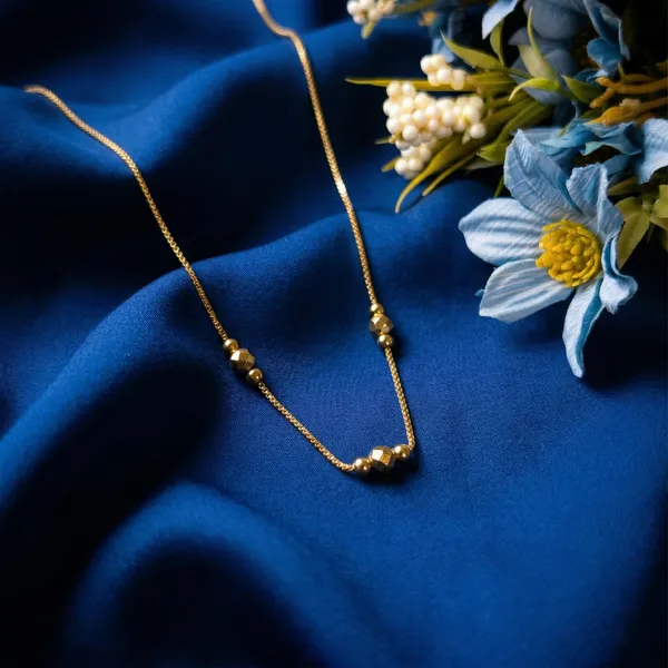Billie__Diamond-Cut_Gold_Bead_Necklace