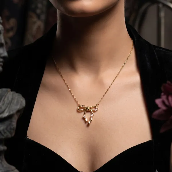 Britta_Gilded_Knot_Bow_Crystal_Pendant_Necklace
