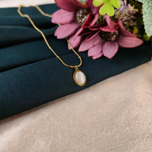 Dorothy_Luminous_White_Cat’s_Eye_Satellite_Necklace