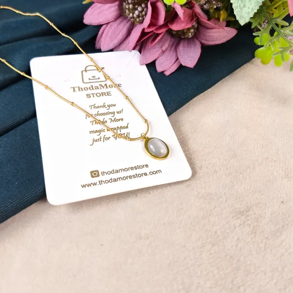 Dorothy_Luminous_White_Cat’s_Eye_Satellite_Necklace