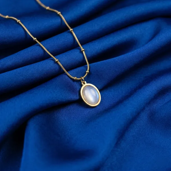Dorothy_Luminous_White_Cat’s_Eye_Satellite_Necklace