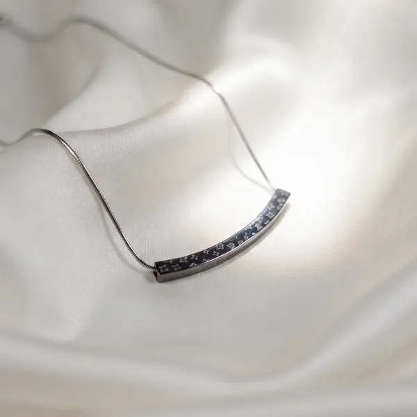 Elise_Monogram_Motif_Curved_Bar_Necklace