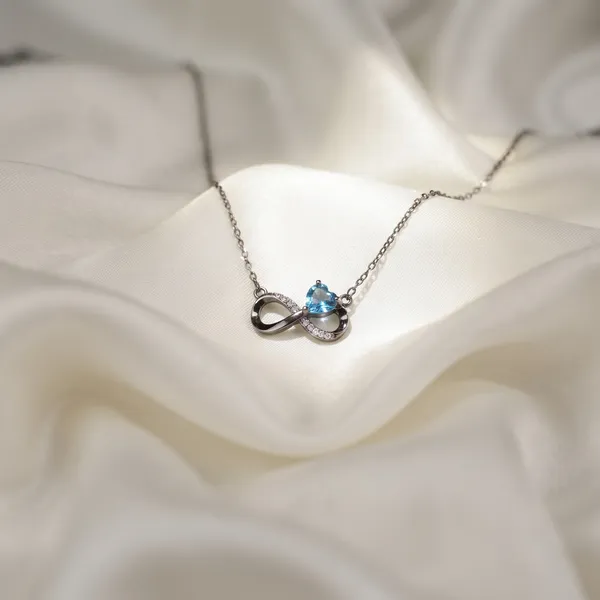 Eliza_Infinite_Azure_Heart_Crystal_Pendant_Necklace