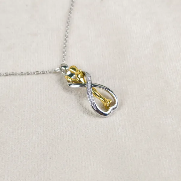 Faith_Embrace_Two-Tone_Couple_Pendant_Necklace