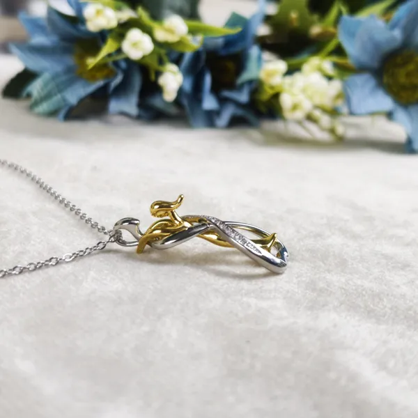 Faith_Embrace_Two-Tone_Couple_Pendant_Necklace