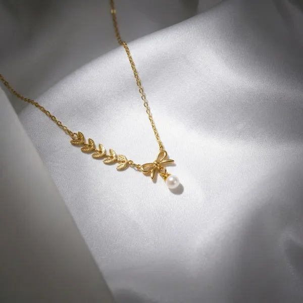 Winona_Pearl_Bow_&_Leaf_Necklace