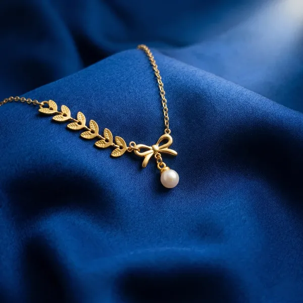 Winona_Pearl_Bow_&_Leaf_Necklace