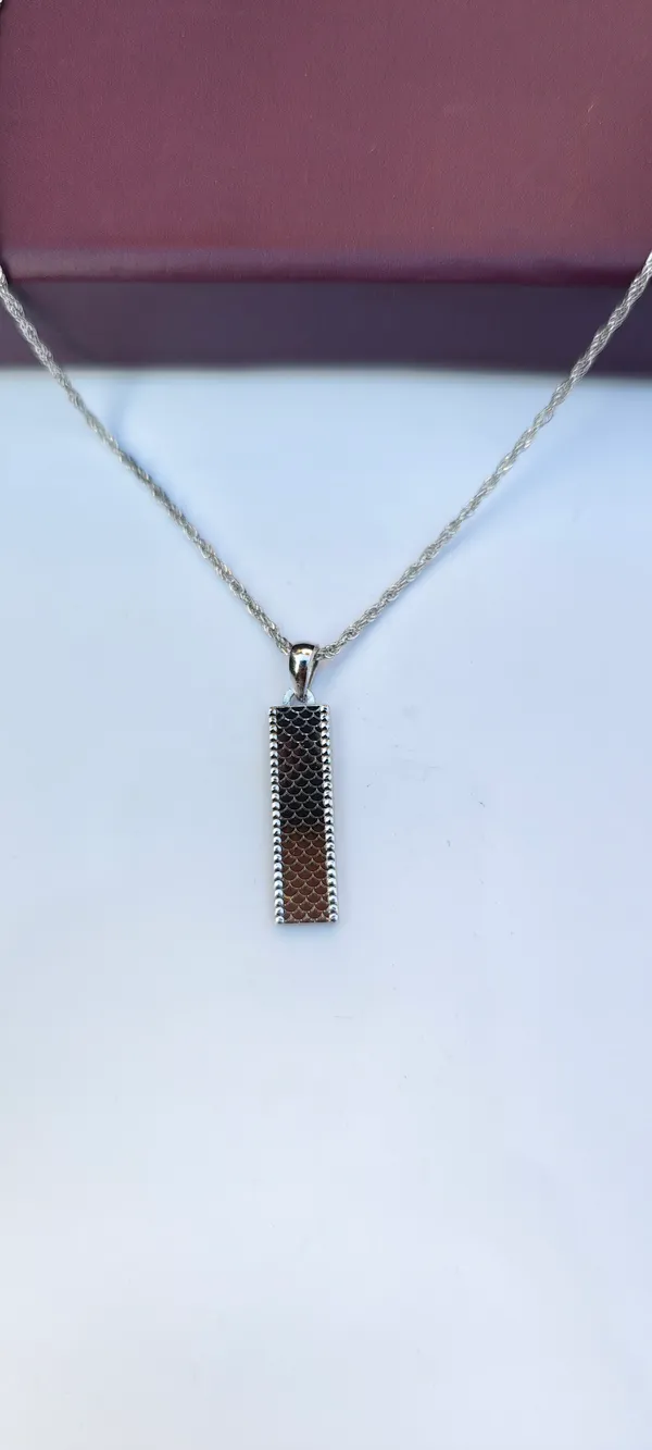 Elegant_Rectangular_Pendant_Necklace_with_Textured_Silver_Finish
