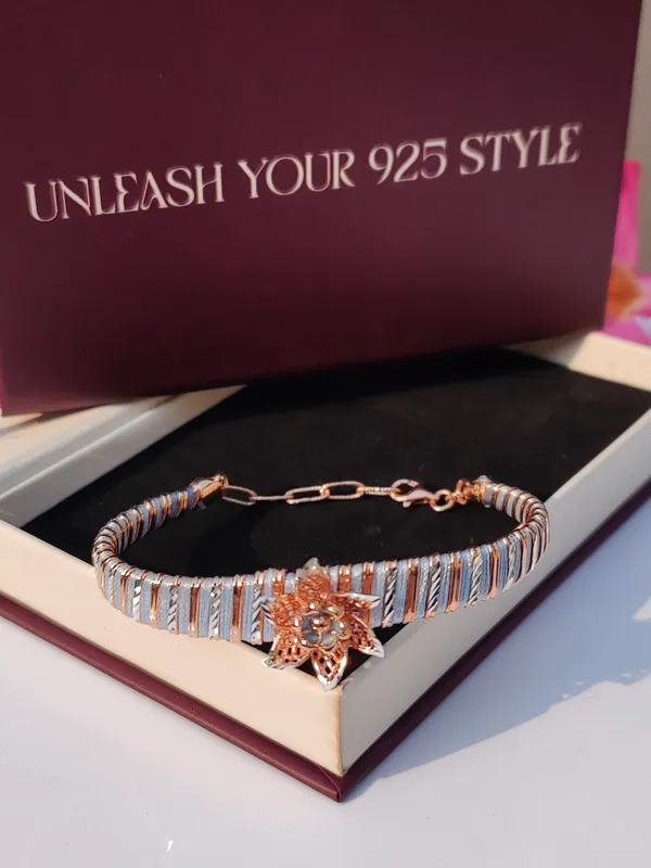 Elegant_Silver_and_Rose_Gold_Tone_Floral_Bracelet_with_Crystal_Accent