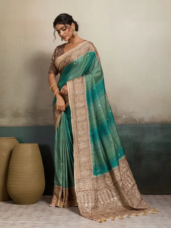 Green_Zari_Border_And_Aari_Embroidered_Pallu_Silk_Saree_For_Women