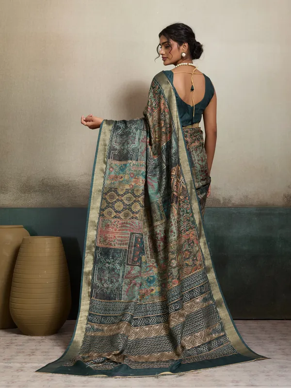 Rama_Green_Intricate_Design_And_Zari_Border_Silk_Saree_For_Women