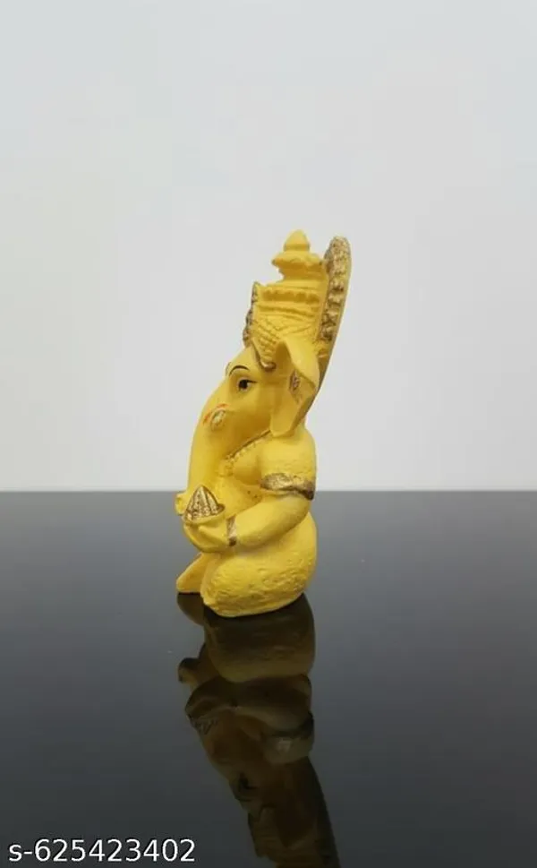 Yellow_Premium_Resin_Lord_Ganesha_Idol_For_Car_Dashboard_Home_Or_Office_|_13_Cm