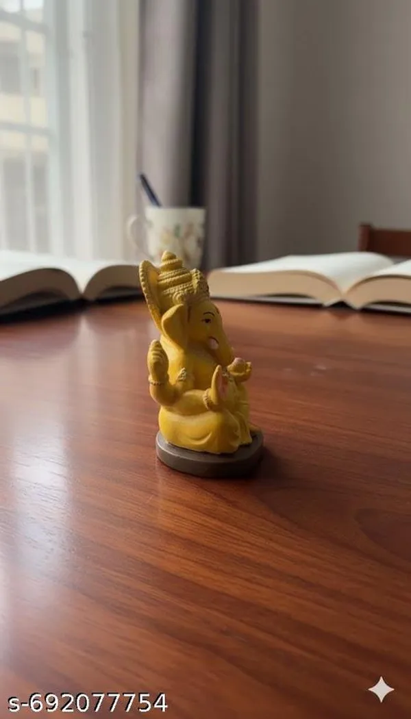 Yellow_Premium_Resin_Small_Ganpati_Idol_For_Study_Table_|_13_Cm