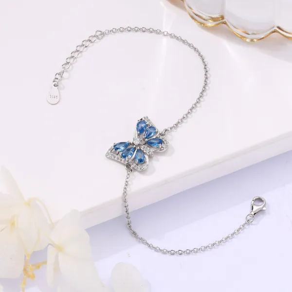 Blue_Topaz_Butterfly_Bracelet_in_925Silver_by_SVADEZI