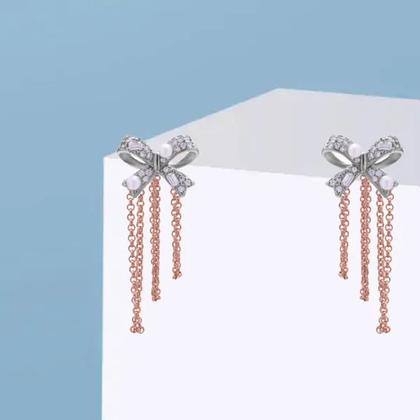Charming_bow_Fresh_Water_pearl_Earrings_in_925_Silver_by_SVADEZI