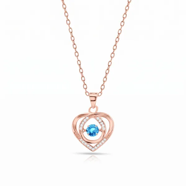 Celestial_Heart_Blue_Topaz_Pendant_in_925_Silver_by_SVADEZI