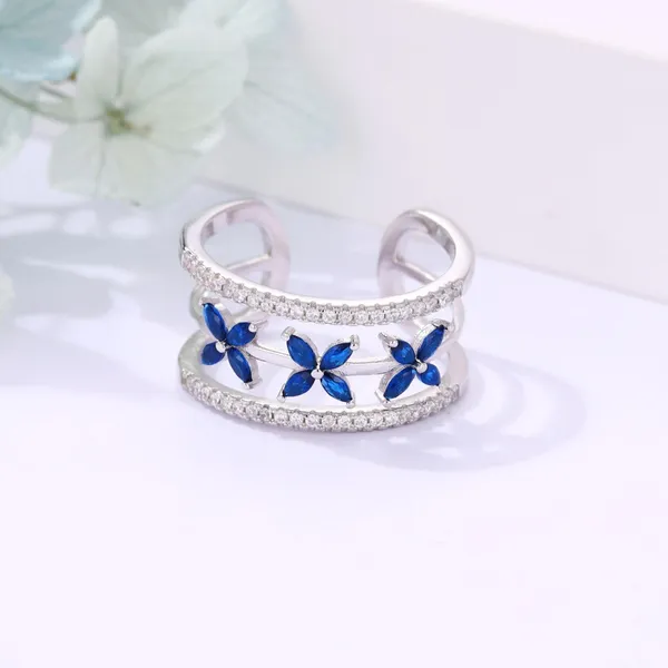 Designer_Blue_Flower_Ring_(Adjustable)_in_925_Silver_by_SVADEZI