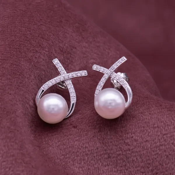 Fresh_water_Pearl_Earrings_in_925_Silver_by_SVADEZI