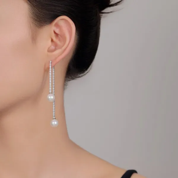 Hanging_lustrous_pearl_drop_earring_in_925_Silver_by_SVADEZI