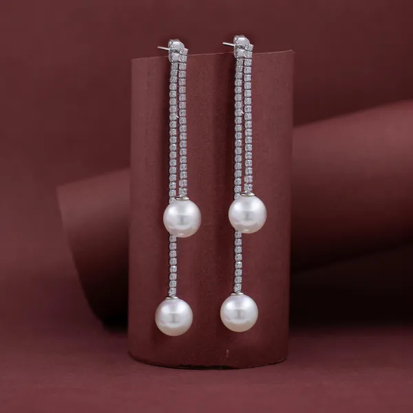 Hanging_lustrous_pearl_drop_earring_in_925_Silver_by_SVADEZI