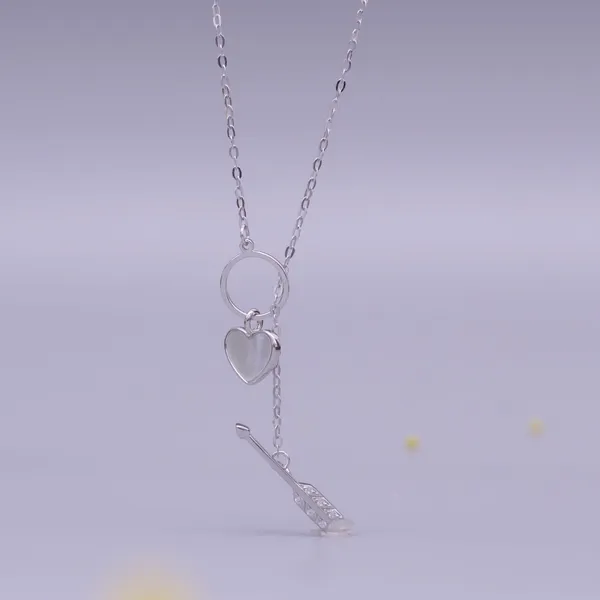 Heart_and_Arrow_Pendant_Crafted_in_Mother_of_Pearl_in_925_Silver_by_SVADEZI
