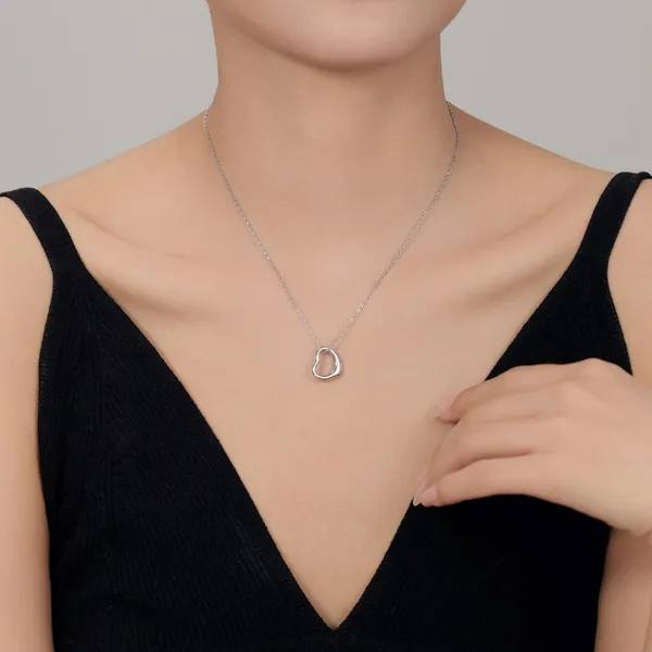 Plain_heart_Pendant_in_925_Silver_by_SVADEZI