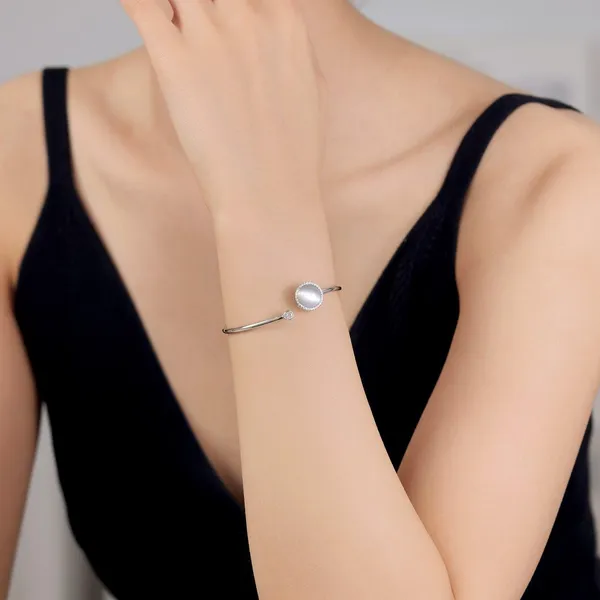 Rotating_Moonstone_khada_in_925_Silver_by_SVADEZI