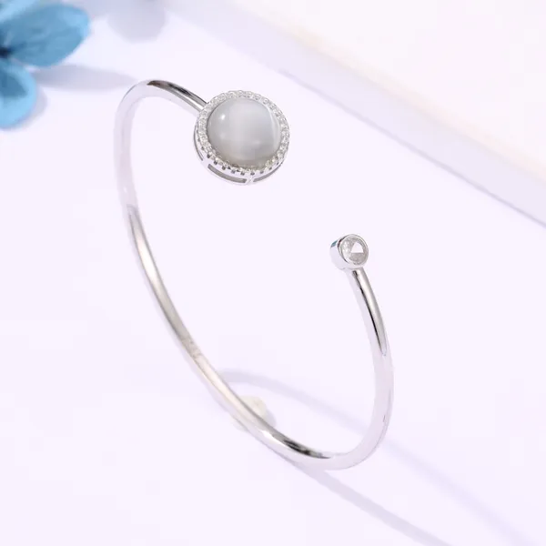 Rotating_Moonstone_khada_in_925_Silver_by_SVADEZI