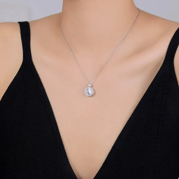 Rotating_Moonstone_pendant_in_925_Silver_by_SVADEZI