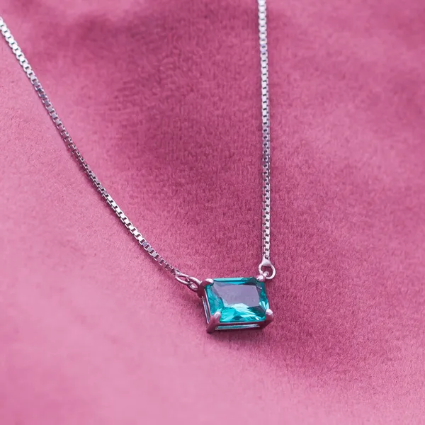 Sexy_Blue_Topaz_Pendant_in_925_Silver_by_SVADEZI