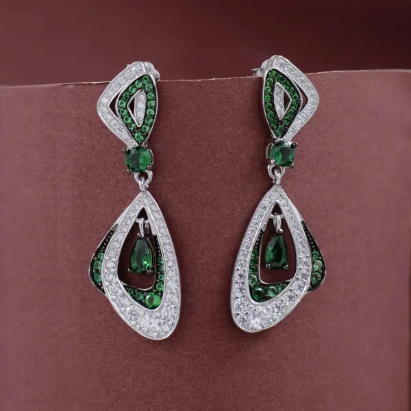 White_Swarovski_Zircon_with_Green_Emerald_in_925_Silver_by_SVADEZI