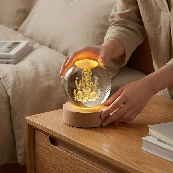 Golden_Led_Crystal_Ball_With_Lord_Ganesha_Engraving_And_Wooden_Base