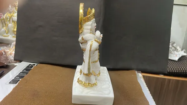 Premium_White_Gold_Marble_Radha_Krishna_Idol_(18_x_12_x_7.5_cm)_–_Elegant_Gold_&_White_Finish_for_Luxury_Home_&_Office_Décor