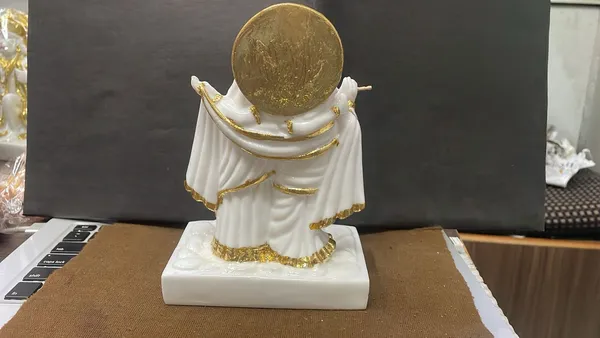 Premium_White_Gold_Marble_Radha_Krishna_Idol_(18_x_12_x_7.5_cm)_–_Elegant_Gold_&_White_Finish_for_Luxury_Home_&_Office_Décor