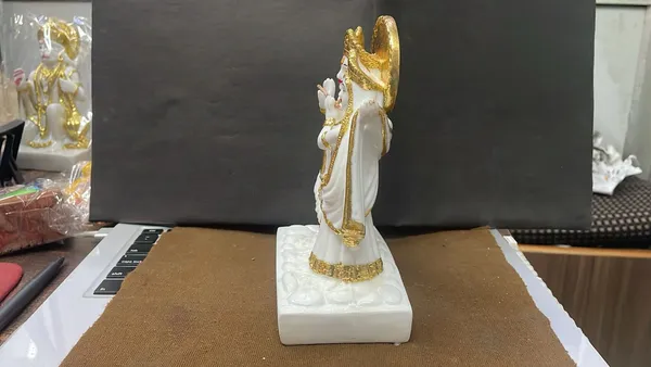 Premium_White_Gold_Marble_Radha_Krishna_Idol_(18_x_12_x_7.5_cm)_–_Elegant_Gold_&_White_Finish_for_Luxury_Home_&_Office_Décor