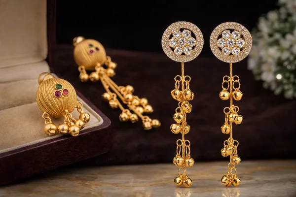 Elegant_Gold_Toned_Crystal_Embellished_Dangling_Earrings_with_Jhumka_Bells__And__Traditional_Gold_Toned_Jhumka_Earrings_with_Colored_Stones_for_Women_Pack_Of_2