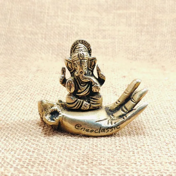 NEO_CLASSIC_Brass_Ganesha_Idol_Sitting_on_Hand_|_2.2_Inch_Ganpati_Murti_for_Pooja,_Home_Temple_&_Decor_|_Hath_Ganesh_Showpiece_Figurine