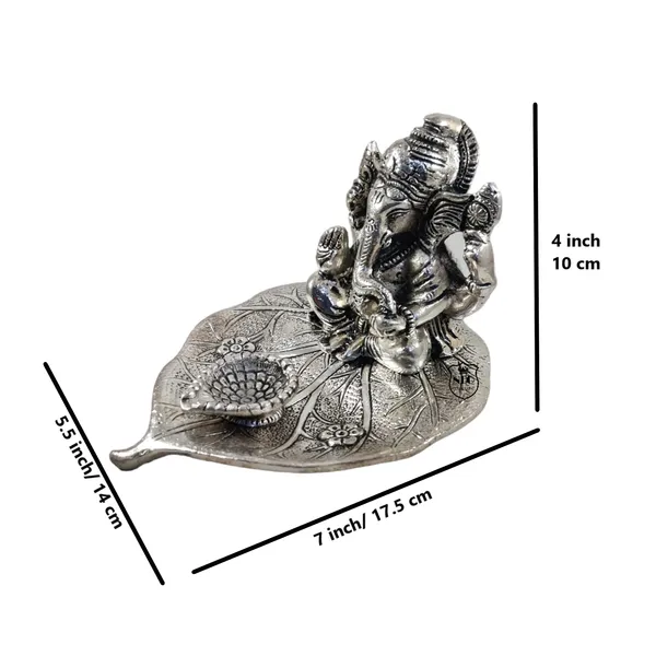 Ganesh_Idol_On_Leaf_Deepak_Lord_Ganesha_With_Diya_Metal_Hand_Craved_For_Home_Decorative_Gift_Puja_Gifts_Corporate_Gift_Silver