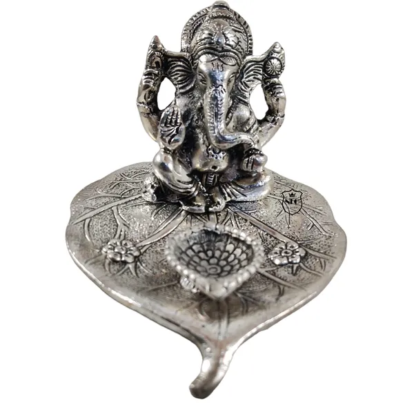 Ganesh_Idol_On_Leaf_Deepak_Lord_Ganesha_With_Diya_Metal_Hand_Craved_For_Home_Decorative_Gift_Puja_Gifts_Corporate_Gift_Silver