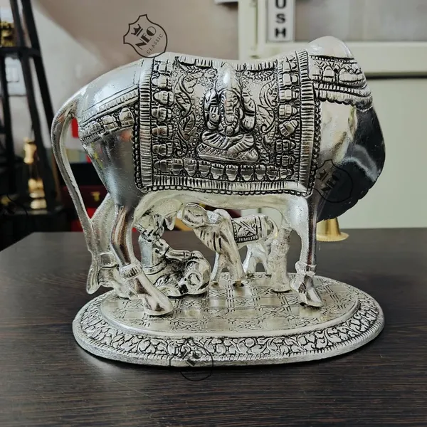 Detailed_Cow_&_Calf_design_with_fine_craftsmanship_Durable_aluminium_metal_construction_Silver_plated_antique_finish_XL_size_with_sturdy_900g_weight_Suitable_for_home,_office_&_temple_décorNEO_CLASSIC_Aluminium_Metal_Cow_with_Calf_Statue_XL_(900g)_|_Silver_Plated_Antique_Finish_|_Decorative_Showpiece_for_Home,_Office,_Temple_&_Gifting
