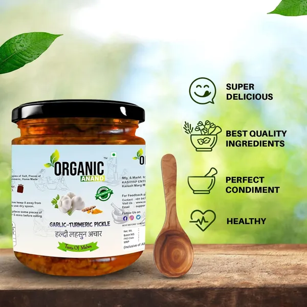Organic_Homemade_Garlic_Turmeric_Pickle_Kachi_Haldi_And_Lahsun_Lassan_Lahsun_Ka_Achar_With_Wooden_Spoon_Flavourful_Delicious_Traditional_Taste
