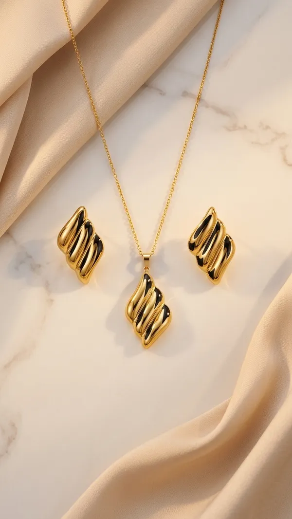 Twisted_Sculptural_Gold_pendant_and_earrings_set